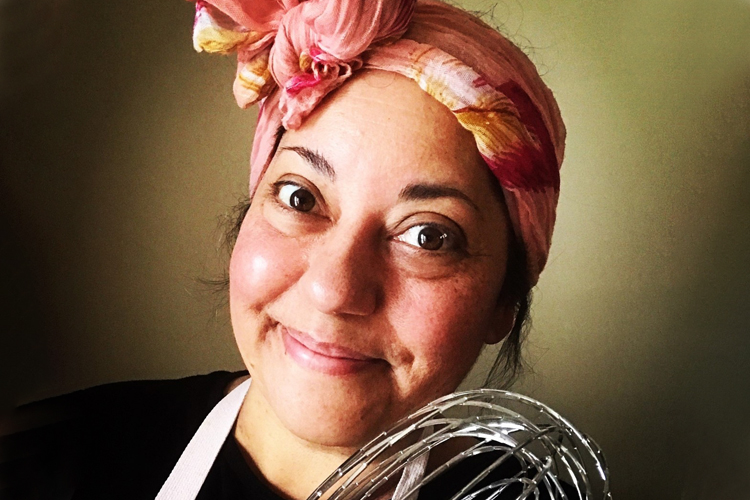 Rosie Coelho poses with a whisk.