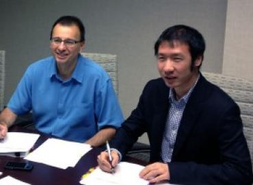Professor Craig Boutilier and Tyler Lu.