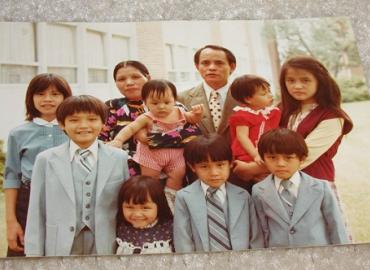 Group photo of Nhung Tuyet Tran as a child with her family