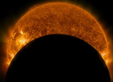 2014 ultraviolet image of the moon eclipsing the sun