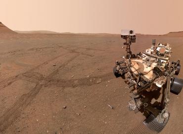 A Mars rover explores the surface of the planet