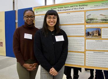 A&amp;amp;S undergraduate students in front of their poster