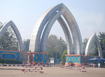 Three peaked archways at the entrance to the Naypyidaw fountain park.