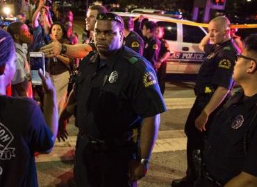 Evening confrontation between police officers and protestors in Dallas.