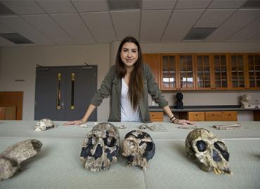 Klara Komza with hominid skulls