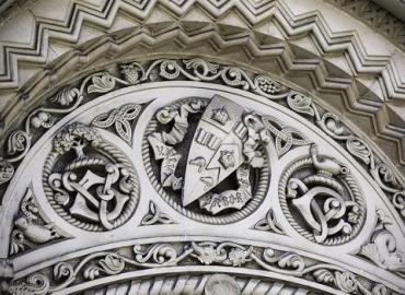 Intricately carved Coat of Arms.