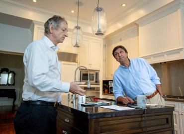 Geoffrey Hinton and Dr. David Naylor talk in Naylor&amp;#039;s Toronto kitchen