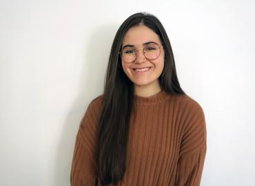 Headshot of Kaylee Baxter in front of a white background