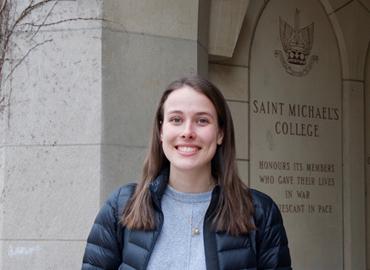 Natasha Klasios poses in front of St. Mike&amp;#039;s sign