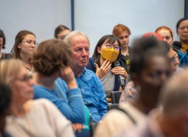 A group of people in a room.