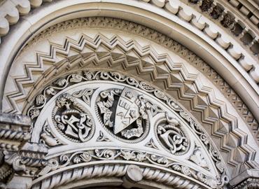 Close up of carved University of Toronto coat of arms