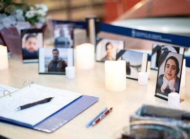 A memorial of pictures and candles.