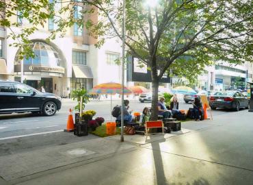 U of T students take over a parking space on Bloor Street West to mark PARKing Day, a global effort to draw attention to the need for public space 