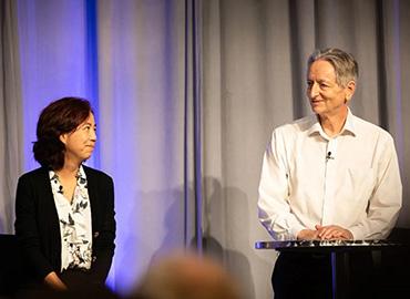 AI luminaries Fei-Fei Li and Geoffrey Hinton on a stage together