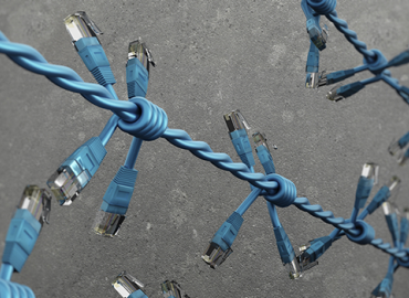 computer cables twisted to resemble barbed wire