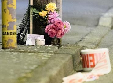 Flowers are laid near the scene of a horrific attack on a mosque in Christchurch, New Zealand. 