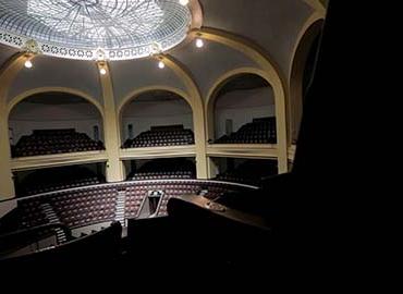 view of the interior of Convocation Hall looking down at the seats from upper balcony
