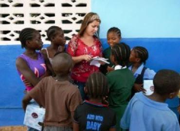 Stephanie Carmichael with kids in Ghana