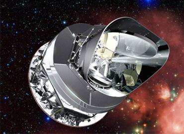 The Planck telescope floating in space.