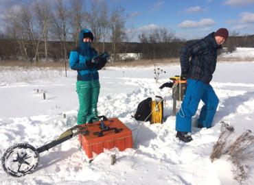 Students with ground-penetrating radar in winter