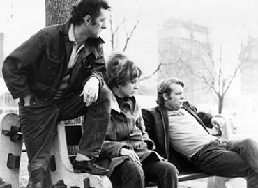 Paul Bradley, Jayne Eastwood, and Doug McGrath sitting on bench in a scene from the film &amp;#039;Goin&amp;#039; Down The Road&amp;#039;