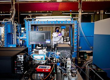 a huge, complex lab with a person doing research