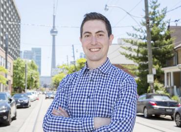 Kevin Swersky in Toronto with the CN Tower in the background.