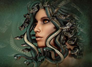 A picture of medusa with snakes in her hair and glowing red eyes.