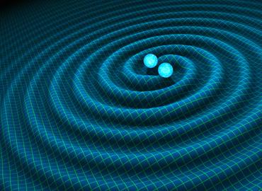Two light blue orbs in the middle of a blue ripple.