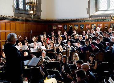 An orchestra playing at Hart House