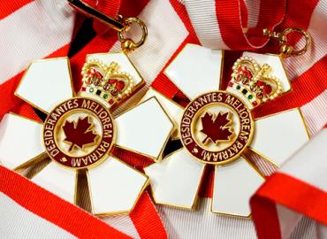 Two medals from the order of Canada. 