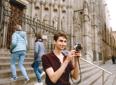 Philip Schwarz holding a camera outside of Sagrada Família - one of Gaudí&amp;#039;s most famous works in Barcelona