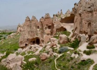 Cave city in volcanic rocks of uplifted Central Anatolian plateau.