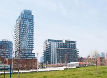an old and new building in Regent Park