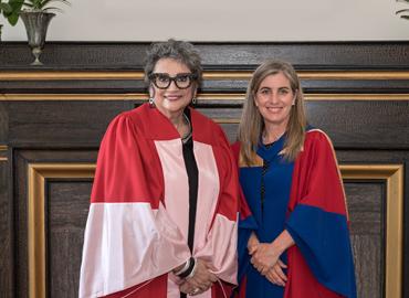 Dean Melanie Woodin and Nada Ristich in Convocation Regalia