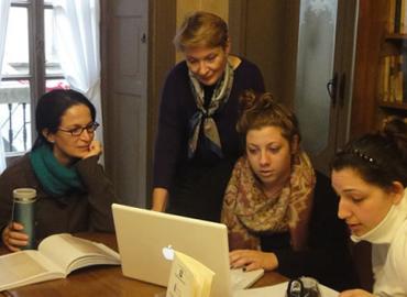 Students Josephine Petrolo, Vanessa Trivisonno and Christina Mauriello with Professor Anne Urbancic