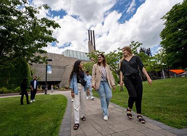 women walking on a university campus