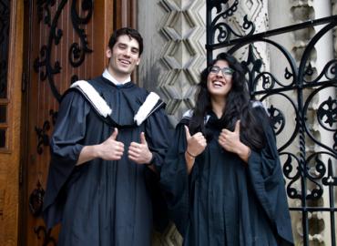 Christopher Lozano and Madhavi Gupta give a thumb&amp;#039;s up on Convocation Day