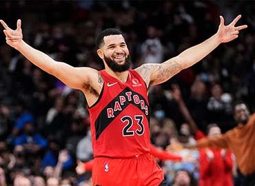 Fred VanVleet arms raised on the basketball court