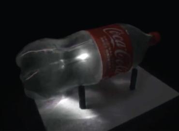 A pulse of light travelling through a pop bottle.