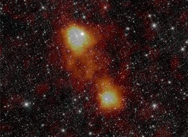 Clusters of large orange masses in a starry sky.