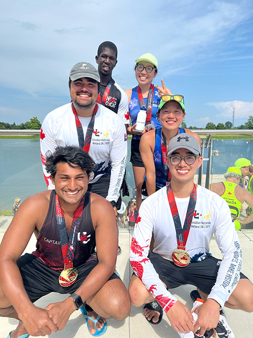 A group of people with medals.