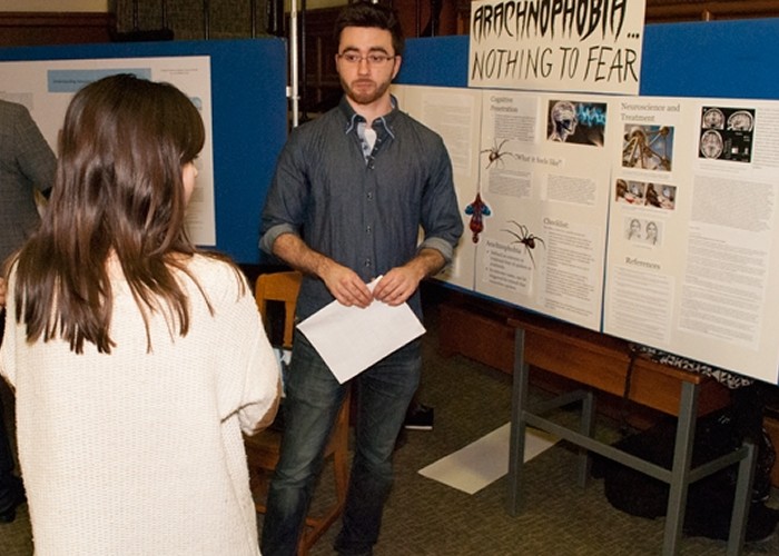 Student with their presentation
