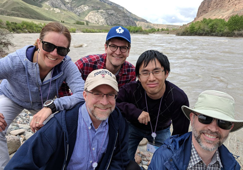 From left to right, Associate Professors, Teaching Stream, Michelle Craig and Paul Gries; Assistant Professor Alec Jacobson; Assistant Professor, Teaching Stream, David Liu; and Associate Professor, Teaching Stream, François Pitt; by the Naryn River and T