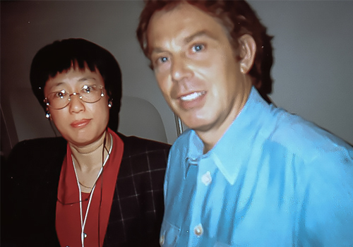 Yuwen Wu and British Prime Minister Tony Blair.